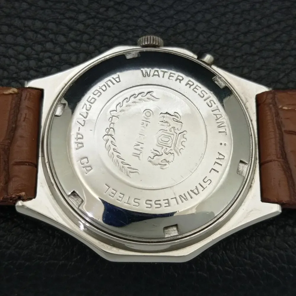 Vintage 1978 Orient Automatic Mens Silver Watch W/daydate & Gold accents